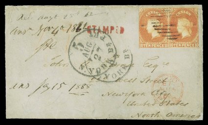 1862 double rate envelope to New York, bearing 10d. dull vermilion pair with clear to large margins on three sides, touched at right, centrally cancelled by oval of bars,
showing red crayon 17, London Paid transit c.d.s. (15.8) in red and