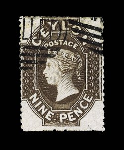 1861-64 watermark Star, intermediate perf. 14 to 15½, 9d deep brown, neatly cancelled by two part strikes of cancelled obliterator perforations trimmed at top and at foot, and
tiny thin at top otherwise fine. Extremely rare, one of three r