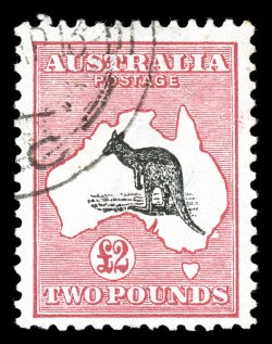 15, 1913 £2 Deep rose and black, a highly desirable used example of this key high value rarity, possessing especially rich color and crisp impressions on fresh paper, well
centered, light c.t.o. cancel confined to the top left corner, very fine