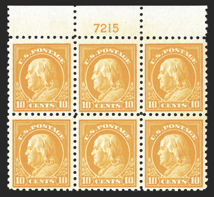 472, 10c Orange yellow, top margin plate no. 7215 block of six, very well centered, radiant rich color on fresh white paper, o.g., l.h., three stamps n.h., very fine and
attractive.