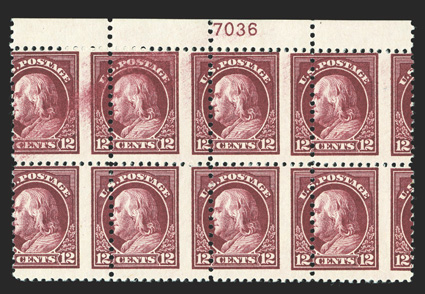 512, 12c Claret brown, top margin plate no. 7036 block of eight, showing a dramatic leftward shift of the vertical perforations which bisect the left third of the stamps, the
top left stamp also shows a natural plate smear, o.g., l.h., numerous
