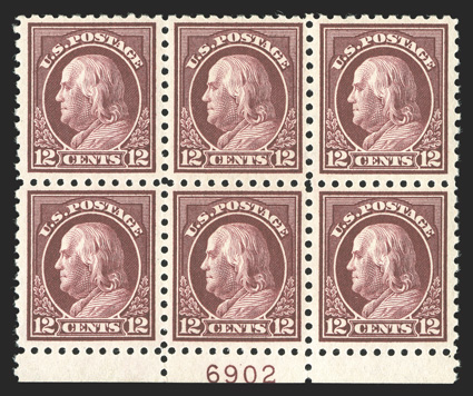 435, 12c Claret brown, bottom margin plate no. 6902 block of six, incredibly well centered throughout, o.g., top right stamp with a repaired tear at top, the other five stamps
all n.h., extremely fine appearance.