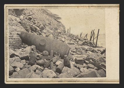 Fort Sumter: Photographs Four scarce carte-de-visite Photographs, two by H.C. Foster of Morris IslandCharleston, SC, as identified in print on back. One shows men in foreground,
two sitting on a huge camera(!) and reads in pen on verso, V